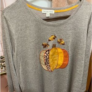 Beautiful pumpkin shirt bought at Cracker Barrel. Smoke free. never worn